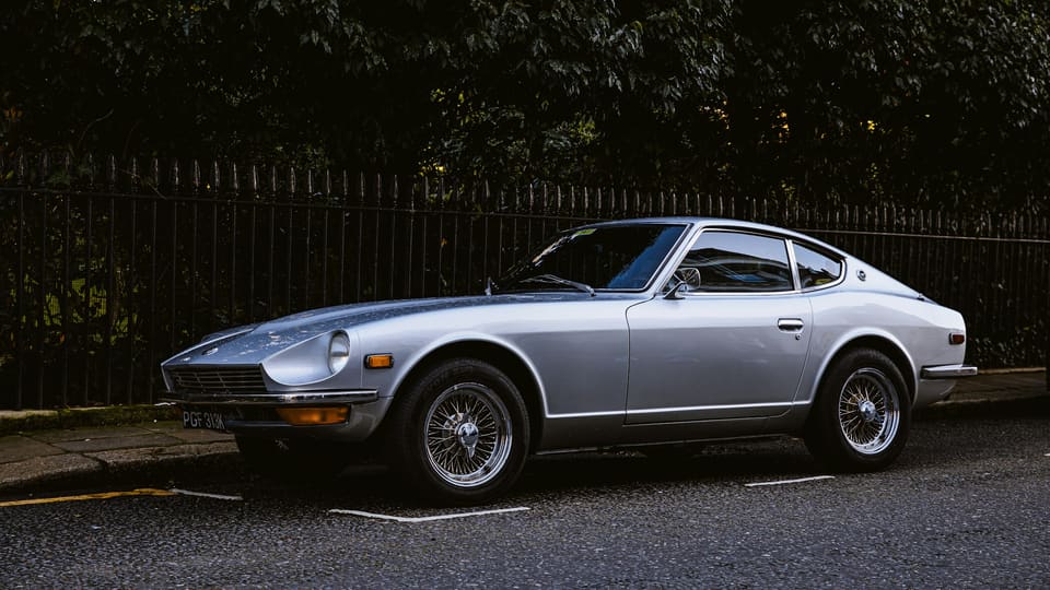The silver coupe, the lead photo of the public card.