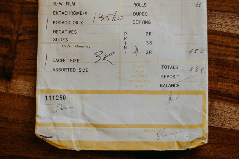 A work order filled in by hand, with parts, labor and totals.